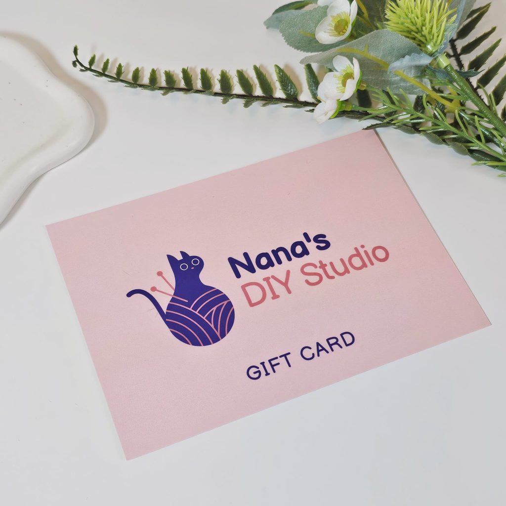 A pink voucher lying on the table